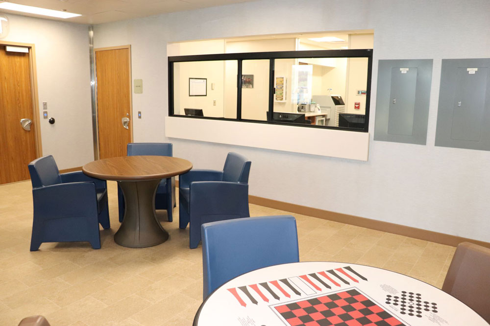 <b>A patient common area and nurses station in the FMCH Geriatric Behavioral Health unit.</b>